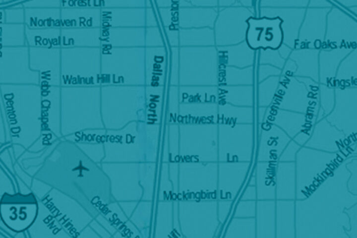 Blue-tinted map of the Dallas area showing major roads and highways (I-35, US 183, SR 482) and nearby landmarks like universities and stadiums